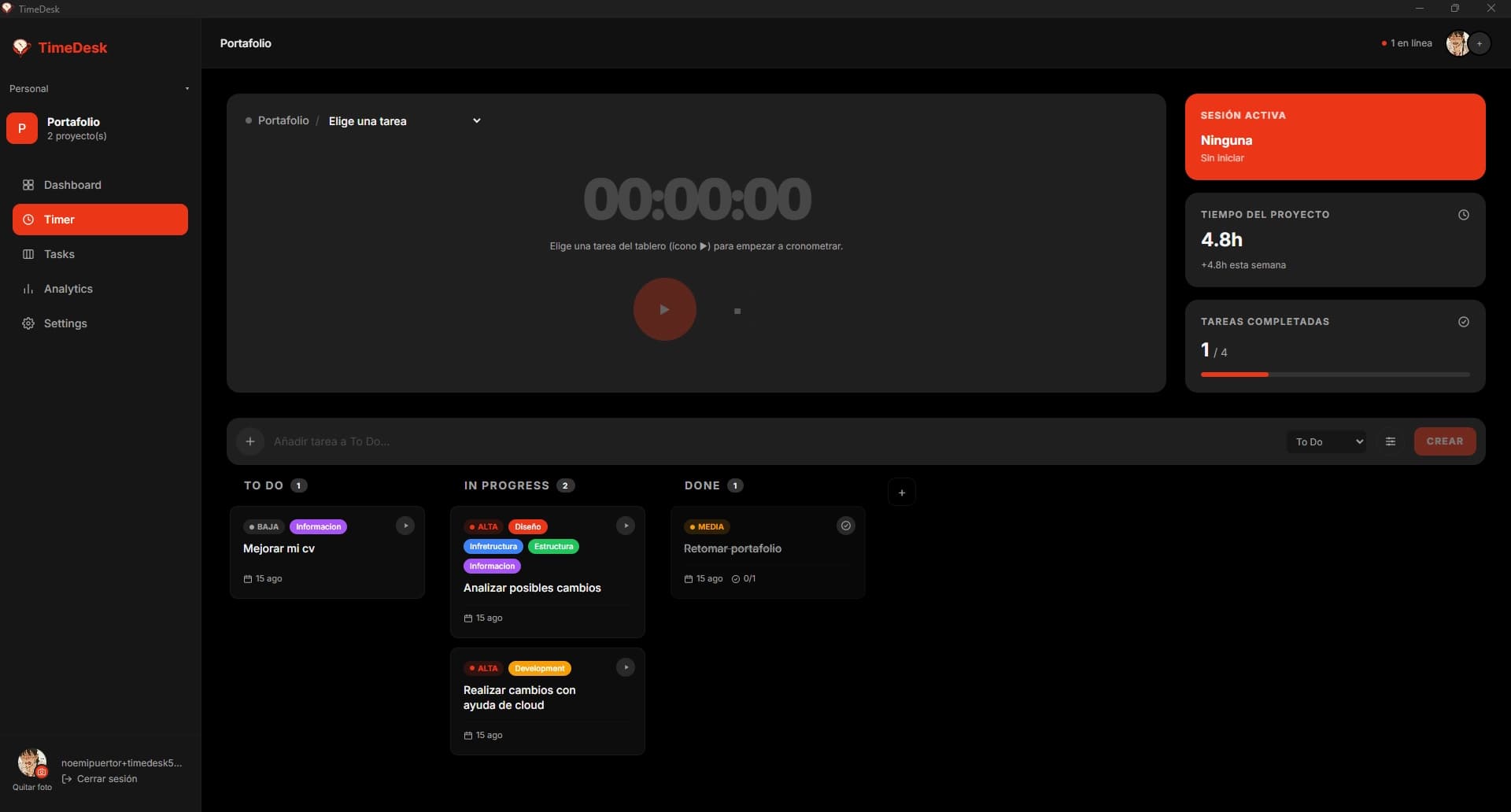 TimeDesk timer view showing an active task, project time, and completed tasks